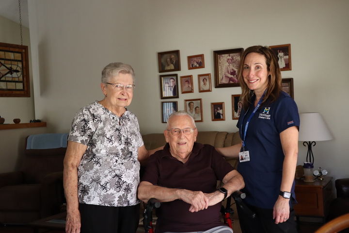 Heritage caregiver with clients at home